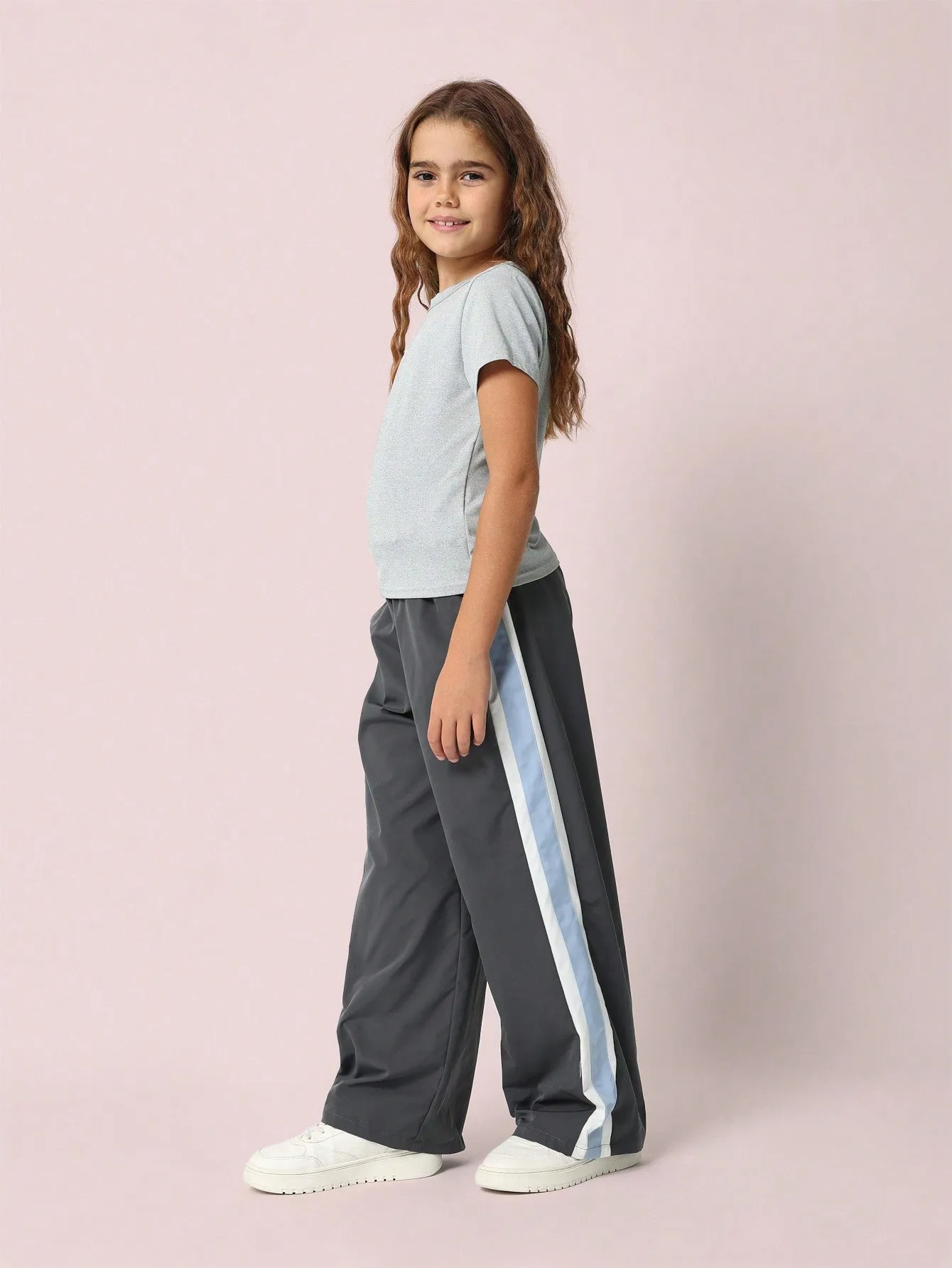 Tween Girls Baby Tee And Straight Fit Nylon Stripe Pant 2 Piece Set